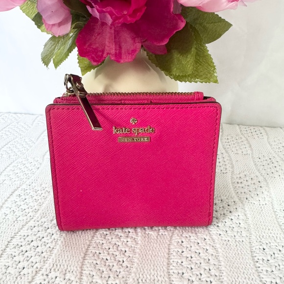 kate spade Handbags - Kate Spade EUC hot pink leather compact wallet
